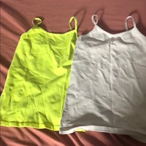 A pair of spandex tank tops